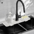 Silicone Faucet Mat for Kitchen Sink – Gen 3 10° Slope Splash Guard with Cuttable Hole – 14” x 5.5” Drip Catcher & Sponge Holder for Kitchen, Bathroom (White) by Meiliweser