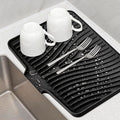 TIKNIK Silicone Dish Drying Mat for Kitchen Counter, Black-1pc, 20" x 15" | Heat Resistant & Non-Slip Dish Drain Pad with Built-In Drain, Dishwasher Safe, Quick-Dry, Hangable & Roll-Up for Storage by TIKNIKHomeOutdoor